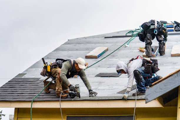 Professional Gutter Installation technician working in Kellogg, ID